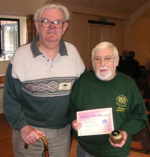 The highly commended winner Norman Smithers received his certificate From Wolf Schulze 